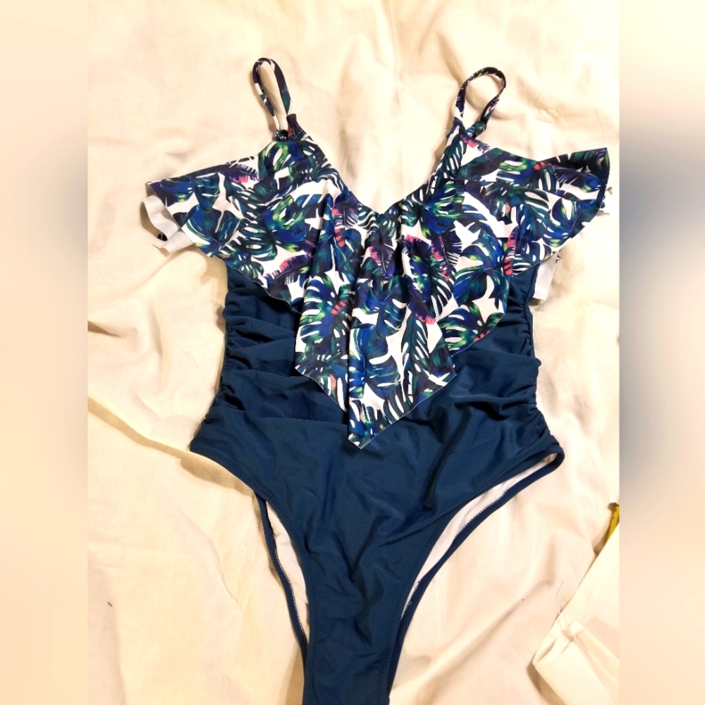Adorable slimming ruffle accent swimsuit